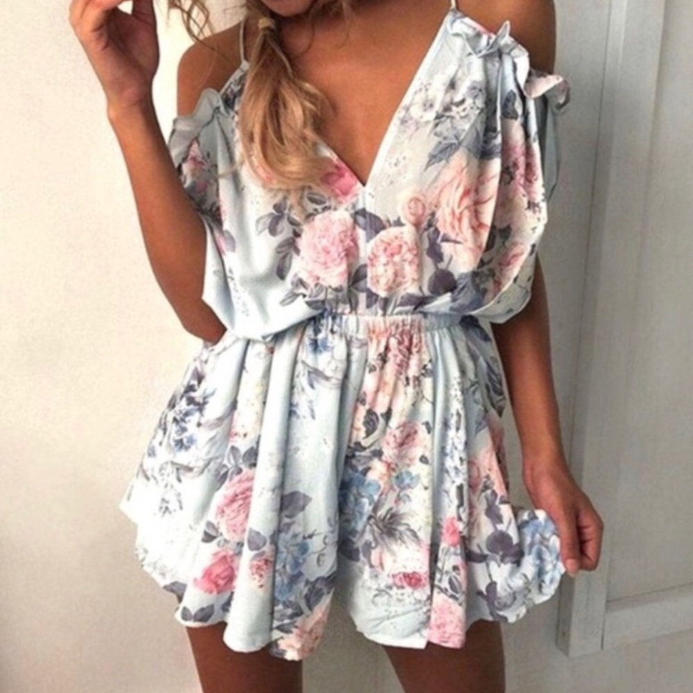 Light blue floral romper size lg